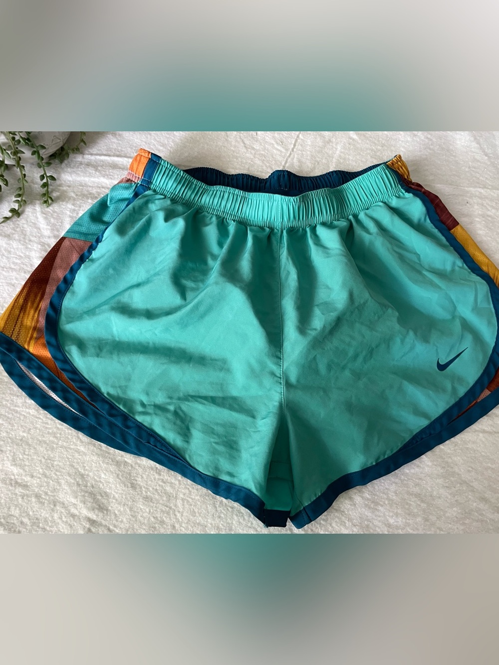 Nike Women's Teal Athletic Shorts with Navy and Gold Trim